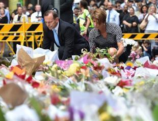 Tearful Australians mourn hostages killed in siege
