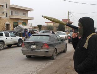 Around 180 Syrian soldiers, jihadists killed in battle for base