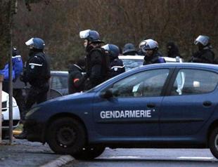 Charlie Hebdo suspects killed as twin sieges rock France