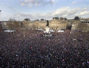 Crowds gather for historic Paris march of defiance and sorrow