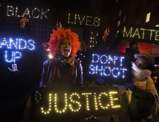 Los Angeles police investigate song mocking slain black teen at ex-cops party