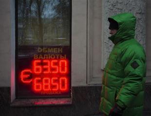 Russia says currency crisis over, but inflation set to soar
