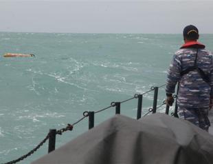 Indonesia expands search for bodies from AirAsia crash