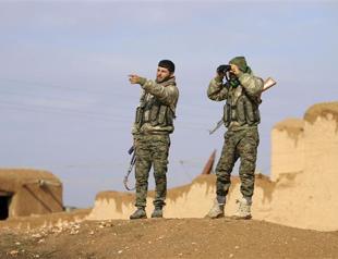 18 dead as Kurds battle regime forces in Syria city