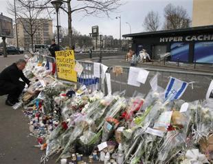 Four to face possible charges over Paris attacks: prosecutor