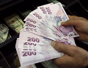 Turkish lira plummets to record lows on possible rate cut