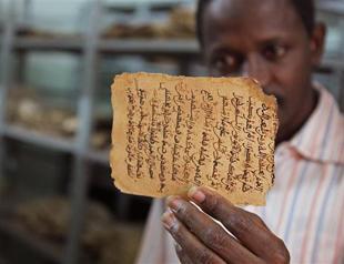 Saved Mali manuscripts face damage in new home