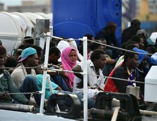 Migrant surge across Mediterranean continues as Italy rescues 900