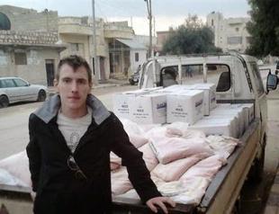 ISIL claims beheading of US aid worker, 18 Syrians