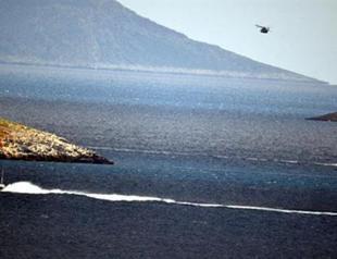 Greek minister leaves wreath at Aegean hotspot, sparking confrontation with Turkey