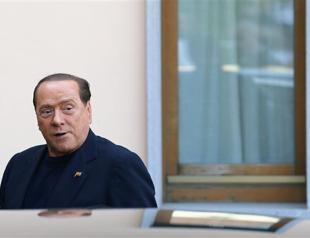Italys Berlusconi wins early release from community service