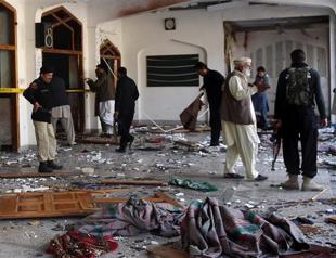 Taliban storm Pakistan Shiite mosque, killing at least 16
