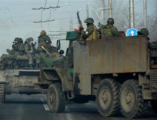 Two killed as Ukraine truce gets off to fragile start