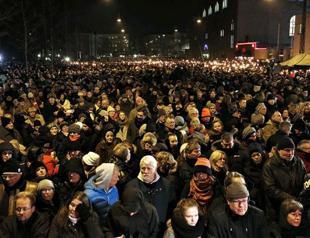 Tens of thousands in Copenhagen vigil for shooting victims