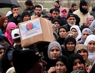 Turkey urges world’s help on Syrian refugees as spending reaches $6 billion