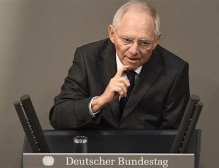 German finance chief softens tone, says Greece needs time