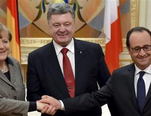 Merkel, Hollande take Ukraine peace plan to Putin