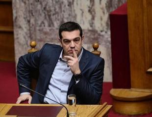 Greece in tough climbdown on radical debt promises