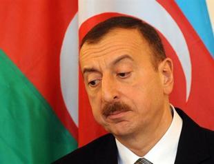 Oil-exporter Azerbaijan devalues currency 33.5 percent
