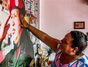 Crisis-hit Venezuela pays tribute to Chavez 2 years on