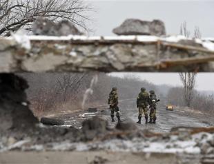 Ukraine peace talks down to wire as fighting rages