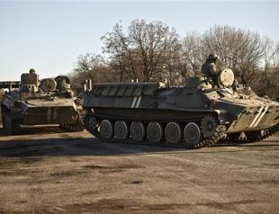 Ukraine calls for peacekeepers after rebels take key town