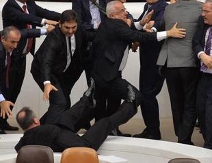 Opposition deputy falls from stairs at Turkish parliament amid fight over security bill