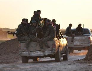 Syrian, Kurdish forces battle ISIL in key border area