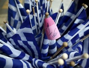 EU warns Greece reform push not there yet