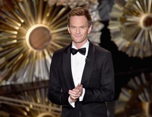 Oscars TV ratings slump, critics slam presenter