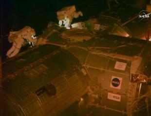 US astronauts step out on spacewalk