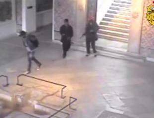 Tunisian president says third museum gunman on the run