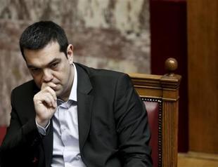 Tsipras tells Merkel impossible to repay debt without EU aid