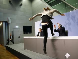 Protester disrupts ECB news conference shouting end dictatorship