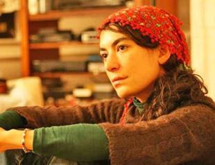 Award-winning Turkish journalist briefly detained over news report