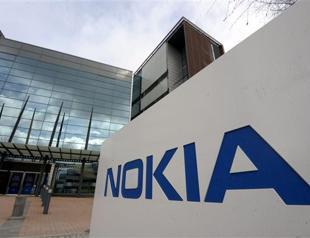Nokia says in talks to buy all of Alcatel-Lucent