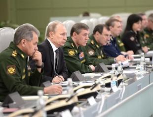 Russias Putin softens anti-US rhetoric with call for economic cooperation