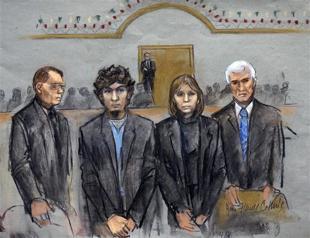 Boston bomber back in court, prosecution demands death