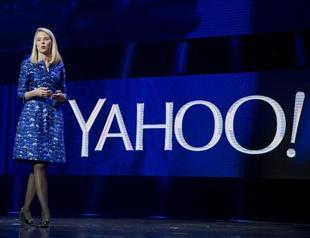 Yahoo quarterly profit slides but revenue up