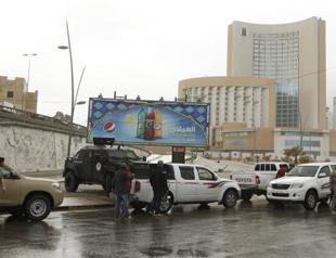 At least eight dead as gunmen storm Tripoli hotel: Libyan official