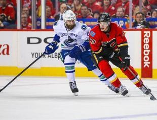 Flames move to second round as NHL post-season heats up