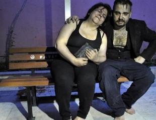 Turkish woman saves two cats from fire, cries for two others