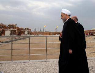 As Iran oil fair opens, foreign companies weigh return