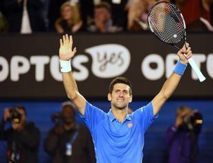 Djokovic fights off Wawrinka to reach Open final