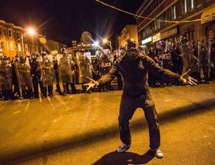 Police enforce curfew in Baltimore, disperse protesters