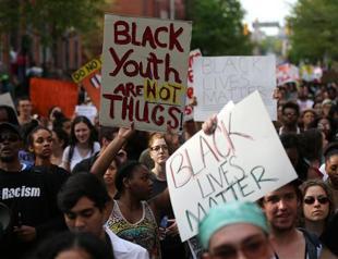 Marchers protest police violence in Baltimore, New York