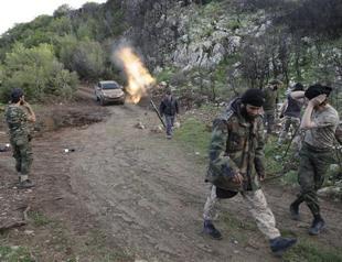 Islamist rebels battle Syrian army near Assad heartland