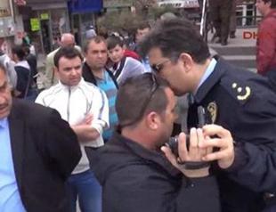 VIDEO: Policeman punches journalist on May Day