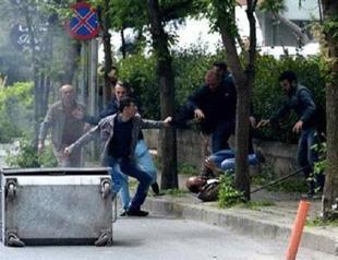 Turkish police thank shopkeepers for beating May Day activists