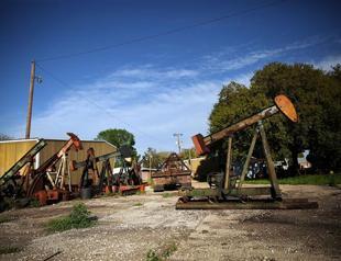 OMV warns on Libya, Yemen as profit hit by oil slump